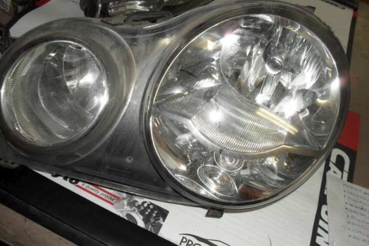 Koplamp links 'AL' Polo/Derby 02-05